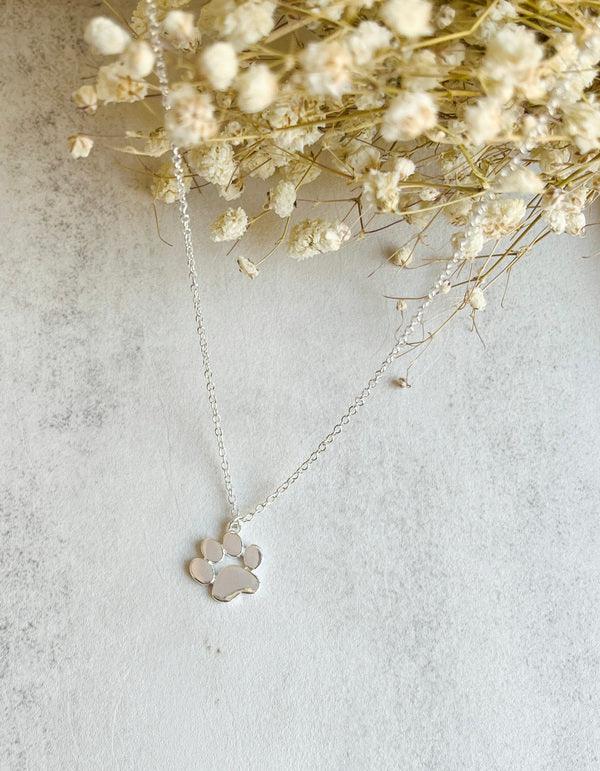 LYA β Stylish Silver Paw Necklace in Stainless Steel for an Elegant Look