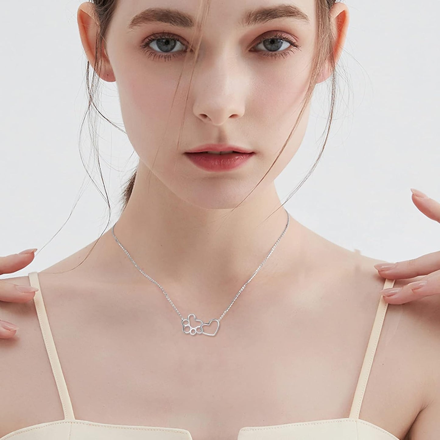 ILYA โ Elegant Paw Necklace made of 925 Sterling Silver with Charming Heart Crystal Pendant
