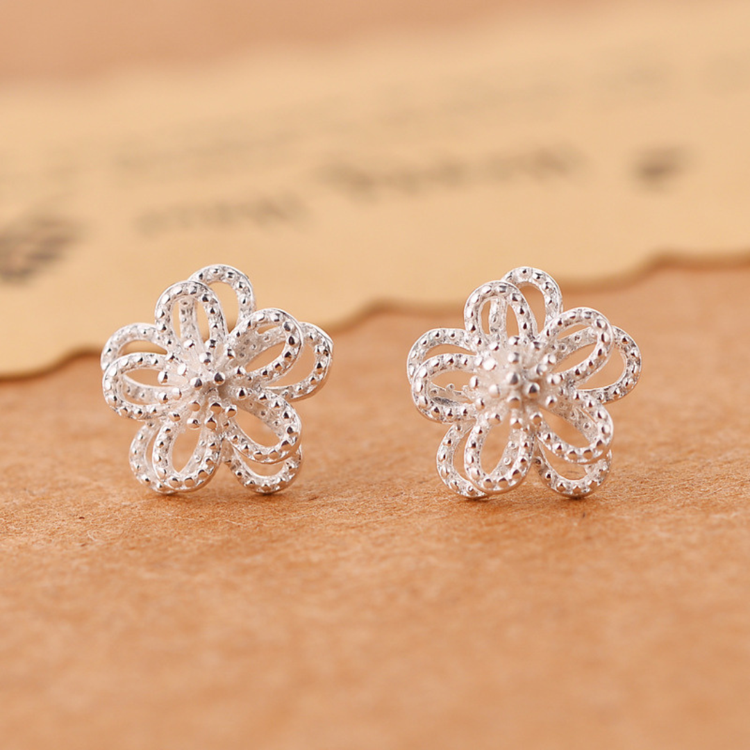 Earrings with a delicate 5-petal flower in silver