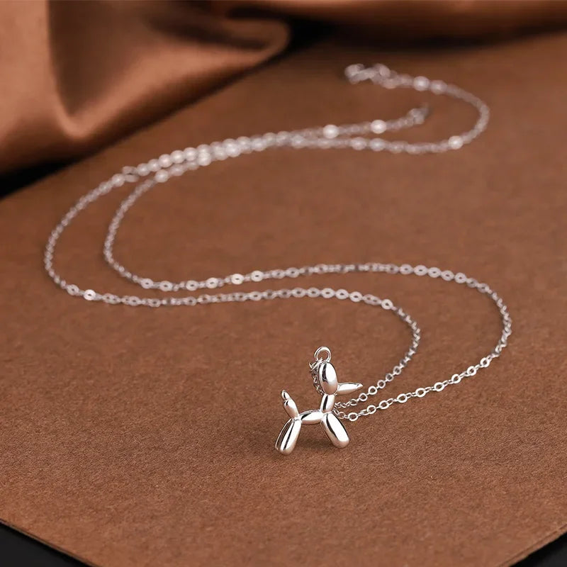 JUNO β Elegant Necklace with Charming Balloon Dog Pendant in Radiant Gold Look