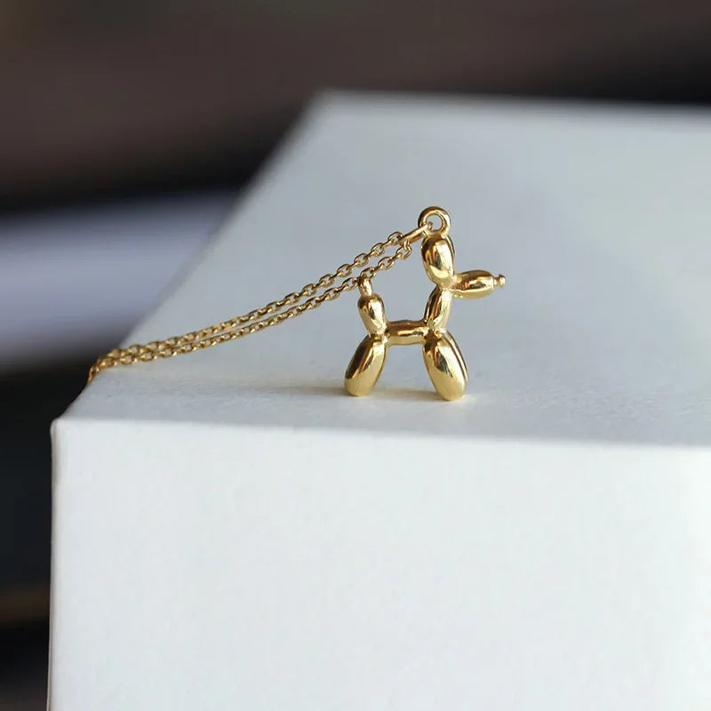 JUNO β Elegant Necklace with Charming Balloon Dog Pendant in Radiant Gold Look