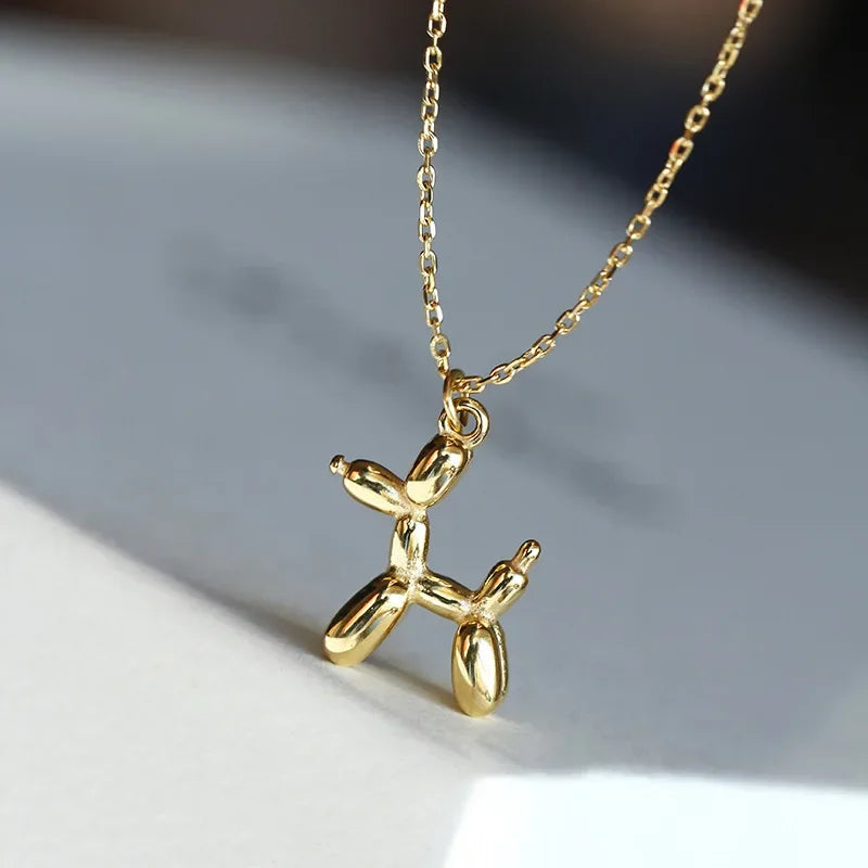 JUNO β Elegant Necklace with Charming Balloon Dog Pendant in Radiant Gold Look