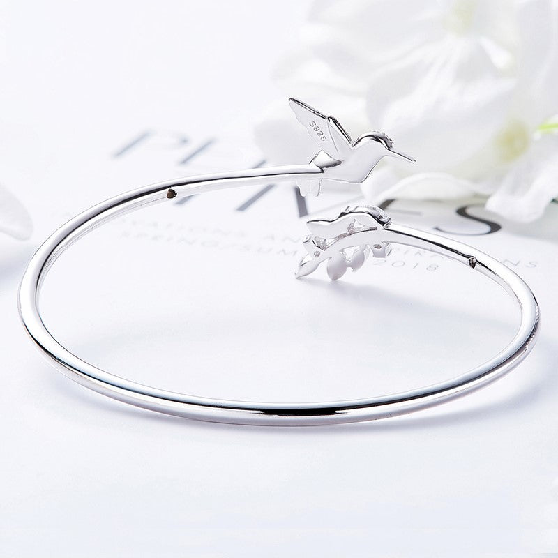 AYANA – Elegant Adjustable Hummingbird Ring with Sparkling Rhinestone