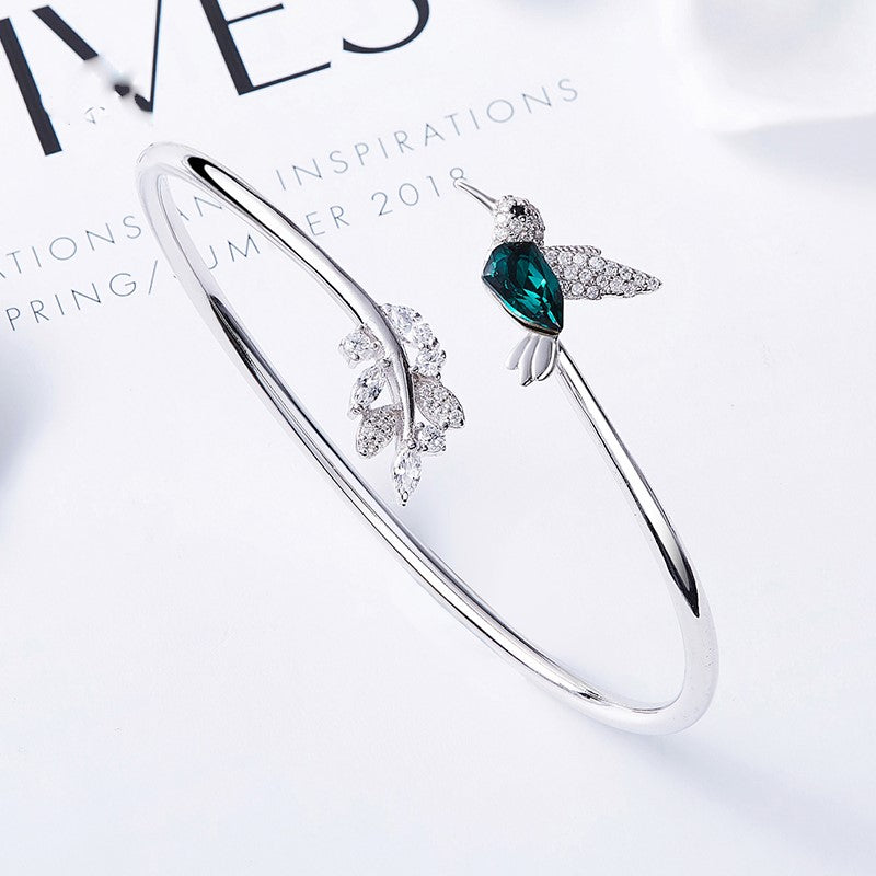AYANA – Elegant Adjustable Hummingbird Ring with Sparkling Rhinestone
