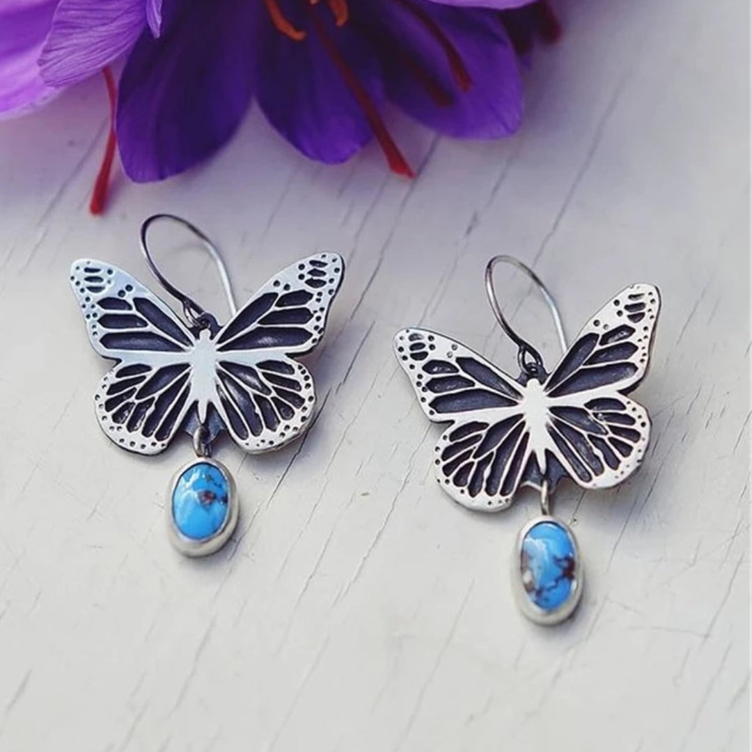 SORELLEI – Vintage Butterfly Earrings in Silver with Blue Stone