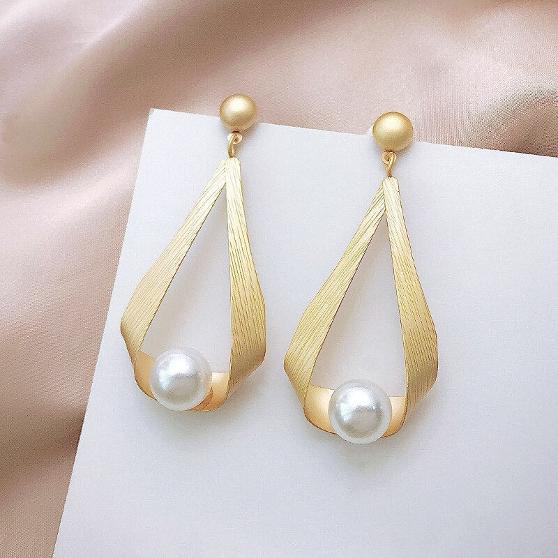 Crystal Earrings and Round Pearls