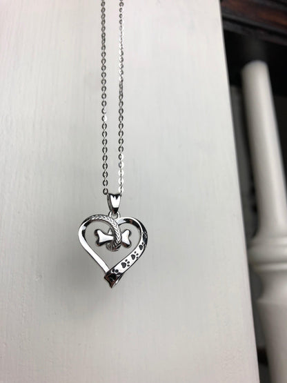 NALA – Elegant Stainless Steel Necklace with Charming Paw and Heart Design