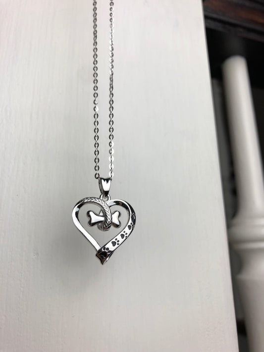 NALA – Elegant Stainless Steel Necklace with Charming Paw and Heart Design