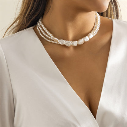 White Stones and Pearl Necklace in Gold
