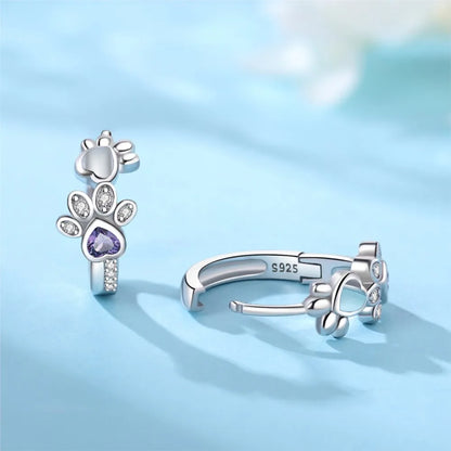 Elegant ILLA Paw Huggie Earrings made of 925 Sterling Silver with Sparkling Zirconia and Heart Stone