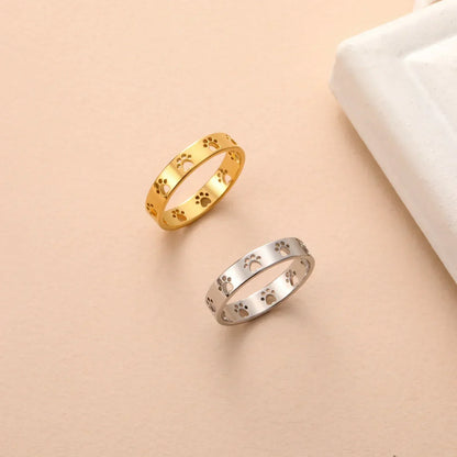 MIRAIE – Elegant Adjustable Paw Print Ring in Shiny Gold Look Made of High-Quality Stainless Steel