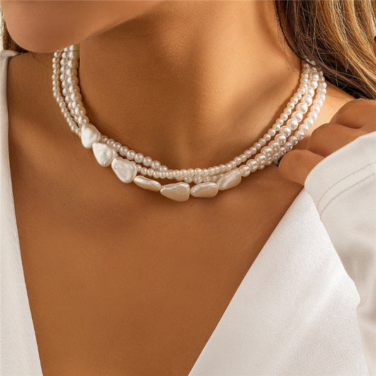 White Stones and Pearl Necklace in Gold