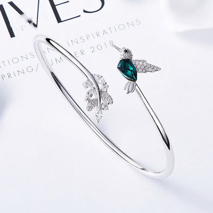 AYANA – Elegant Adjustable Hummingbird Ring with Sparkling Rhinestone