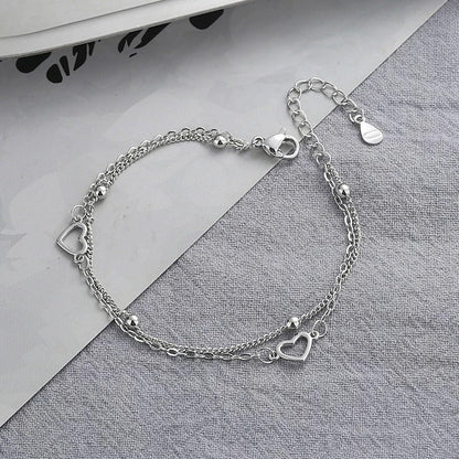 Thin Heart-Shaped Silver Bracelet